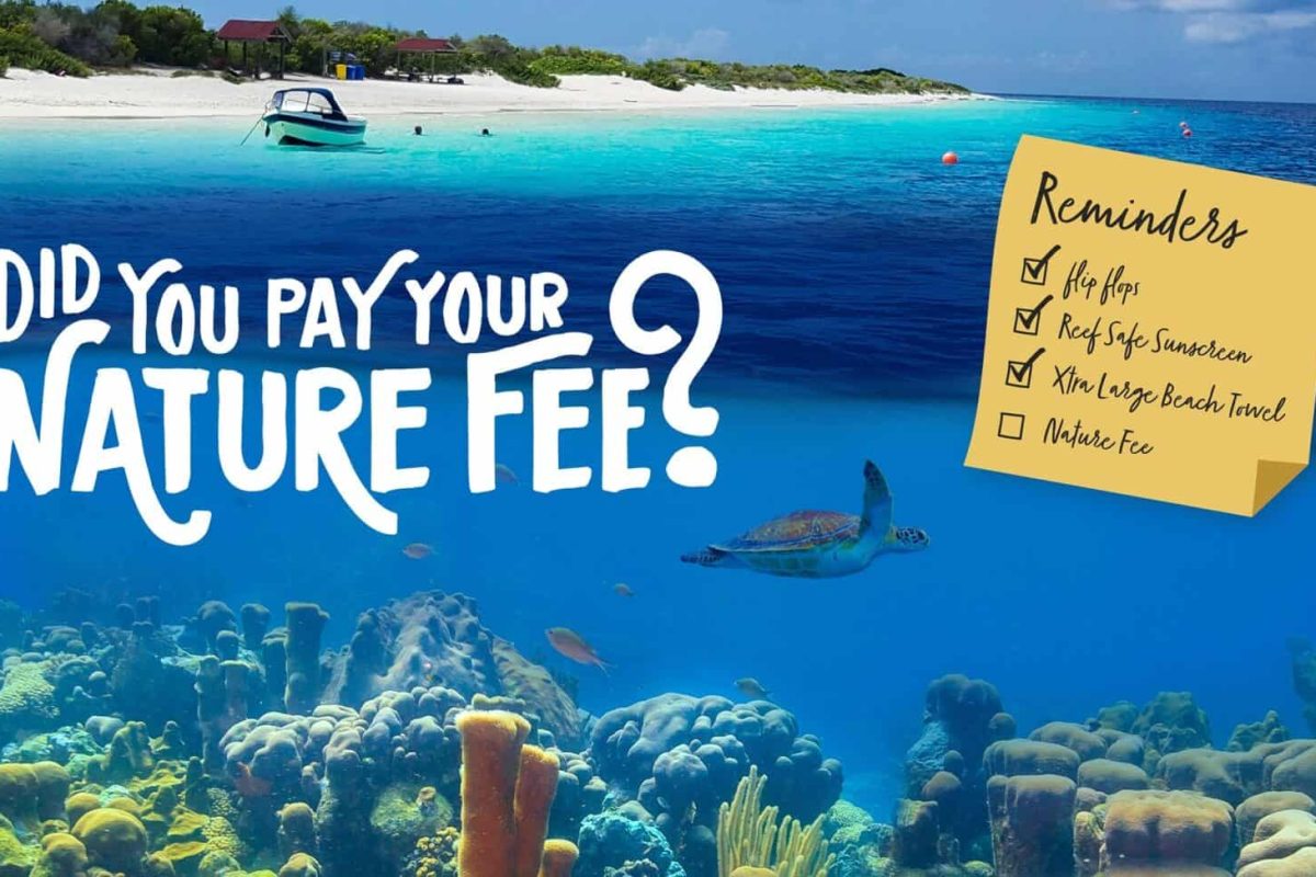 A tropical beach with a boat, turtle and coral is depicted. Text: "Have you paid your STINAPA Nature Tag (Bonaire) fee?". A sticky note has reminders on it: pay the fee, see if your tag sticker is there, visit dive shops and explore the island.